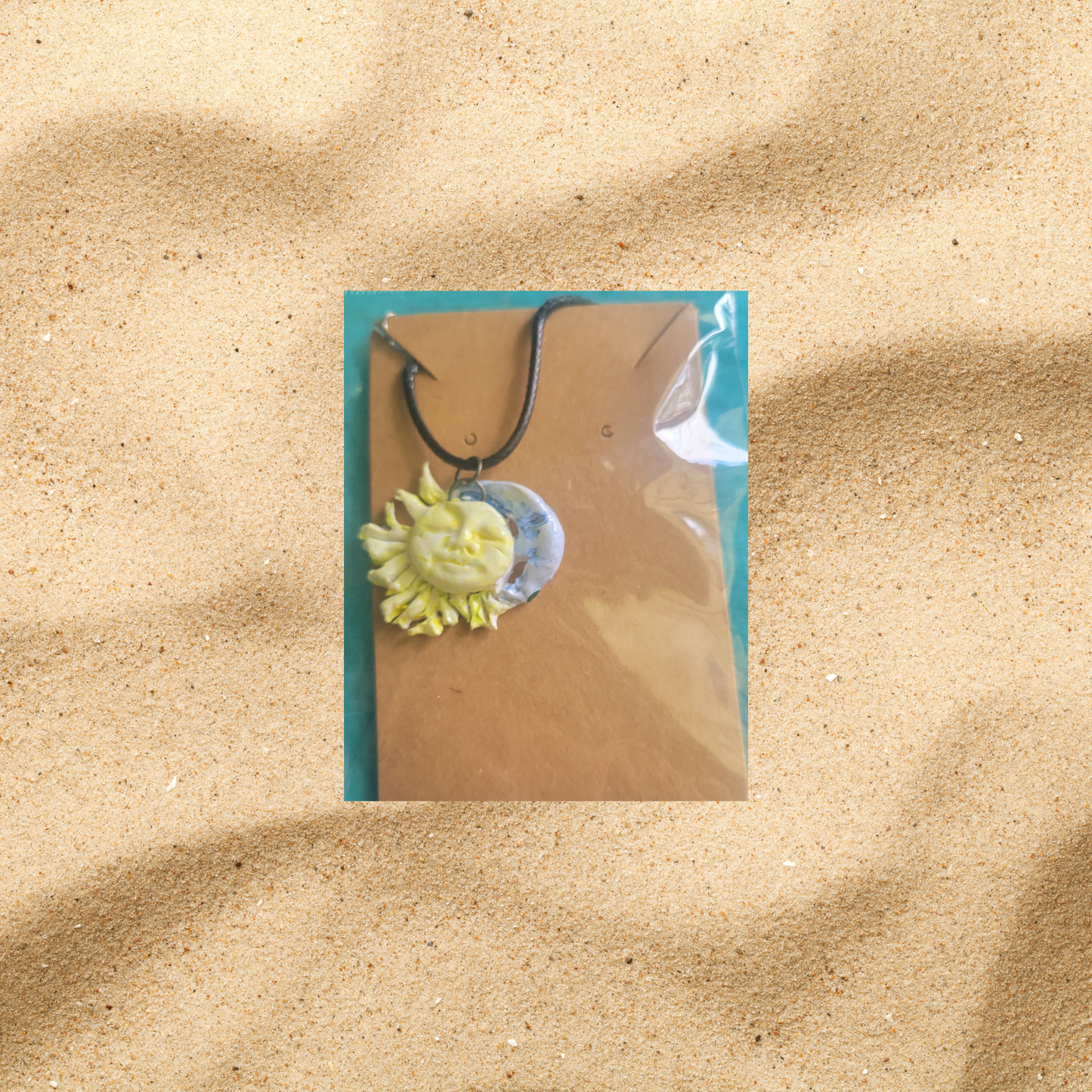 polymer clay sun/moon pendant IP22